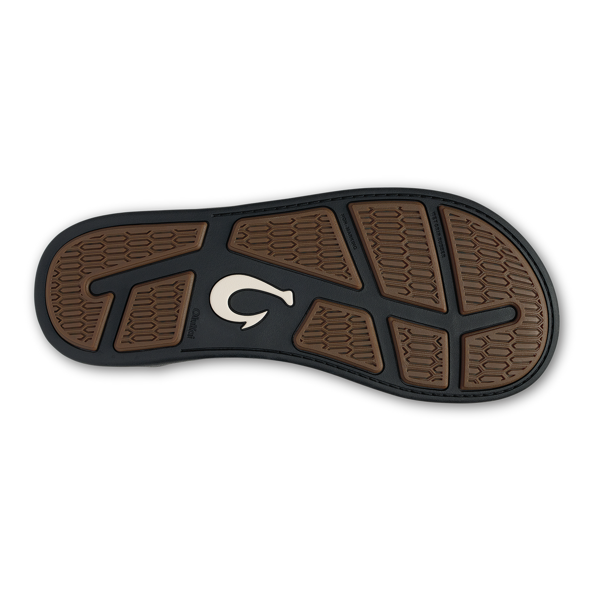 Dark shadow sole with tan lava rock textured panels and white curved logo detail, viewed from underneath.