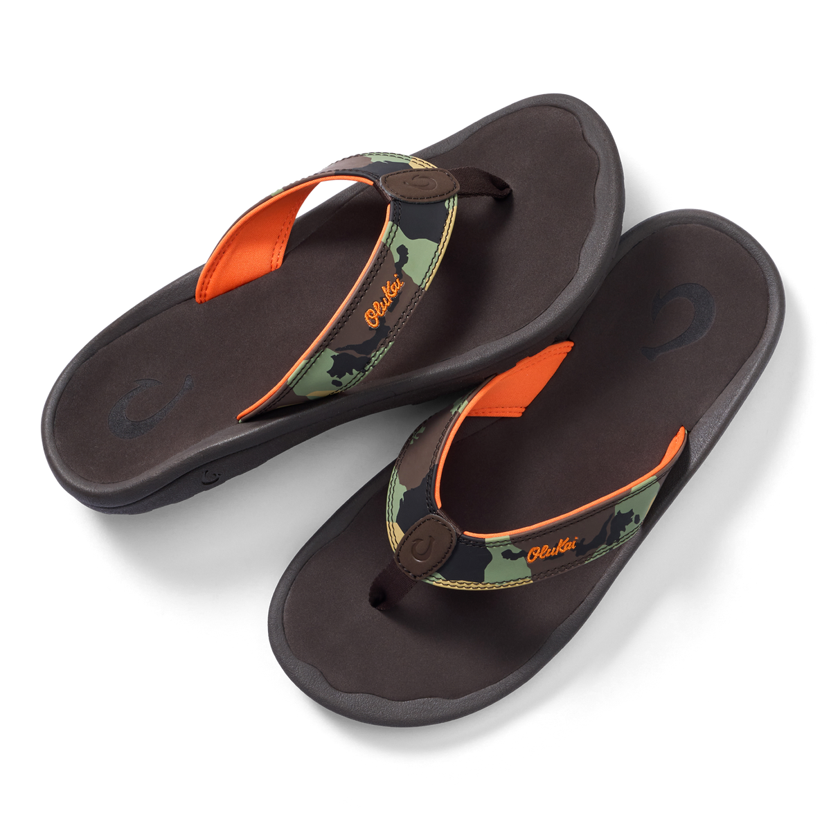 Pair of dark brown thong sandals with camo and orange straps, brown button closure, and cushioned footbeds.