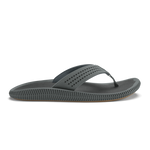 Gray thong sandal with studded upper strap and textured sole in side view.