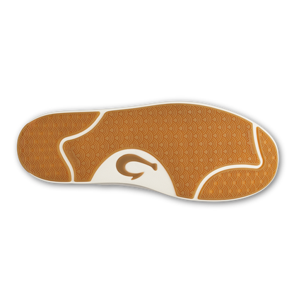 Tan and cream shoe sole with geometric pattern and fox head design.