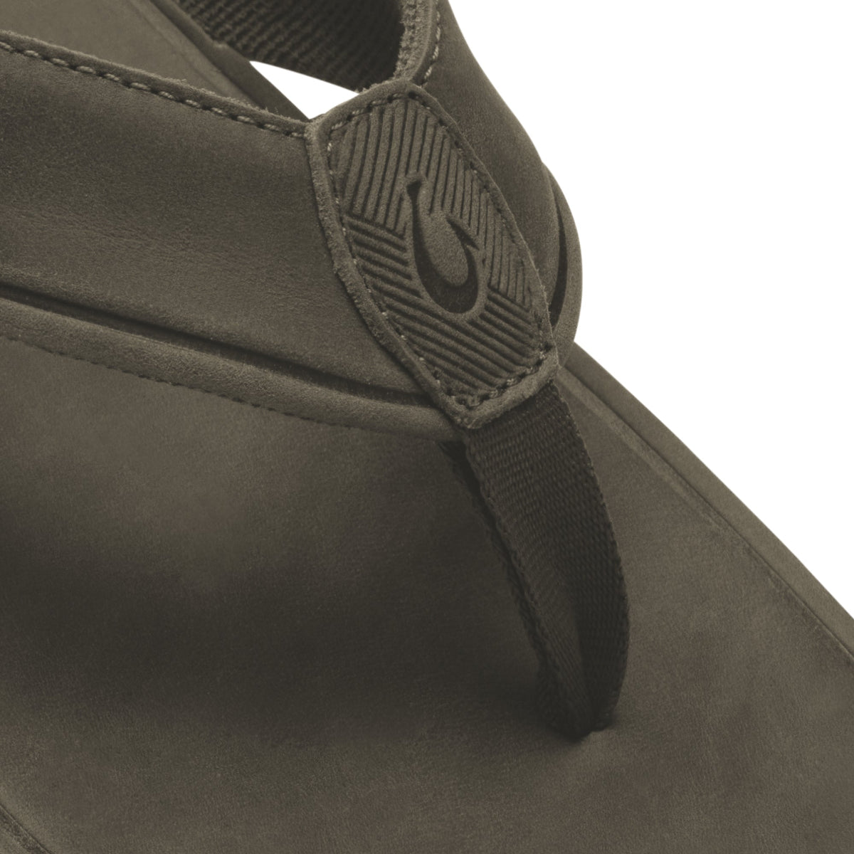 Olive green canvas canteen with adjustable shoulder strap and embossed logo detail.