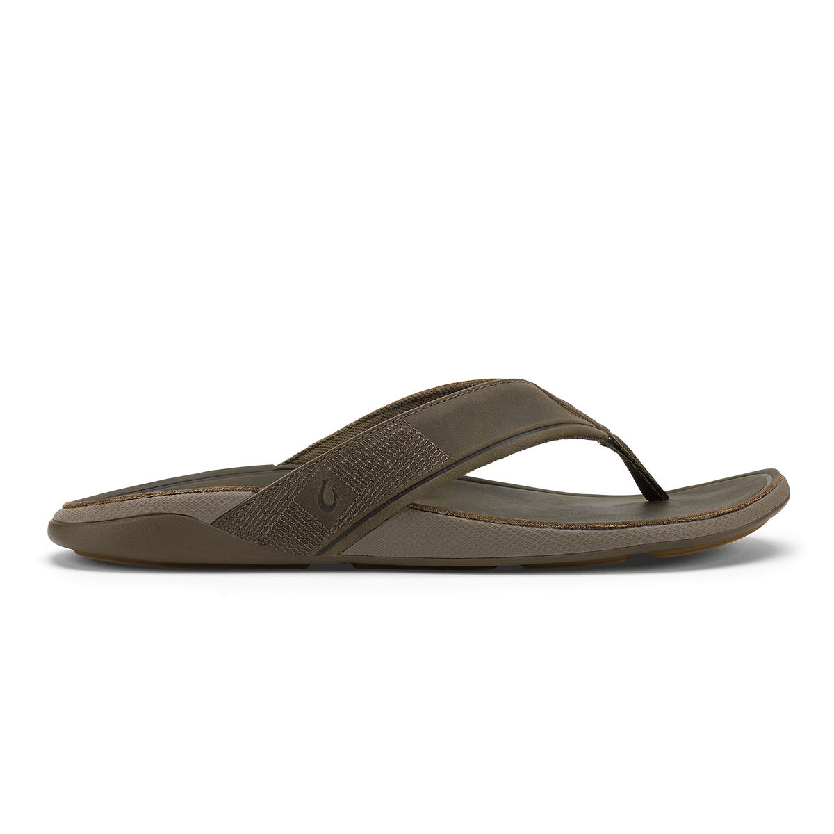 Brown thong sandal with textured fabric strap and cushioned sole, shown in side profile view.