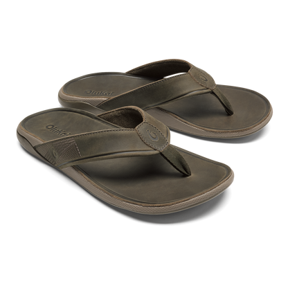 Pair of olive-gray flip-flop sandals with textured fabric straps and molded footbeds.