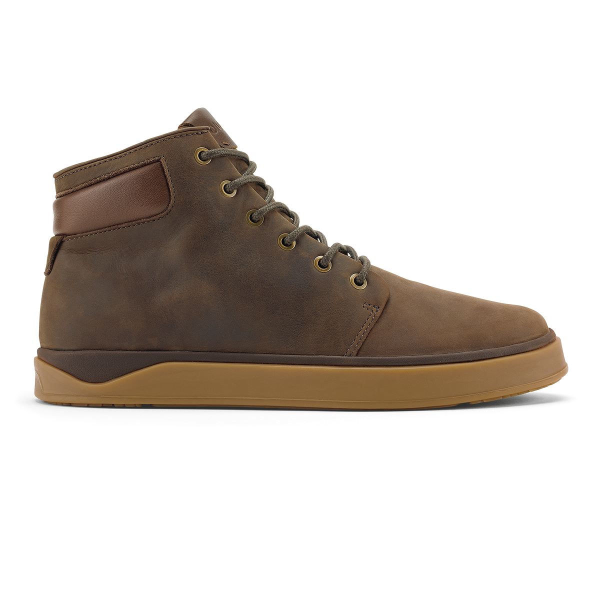 Dark brown leather high-top boot with toffee-colored sole and brass eyelets, shown from the side.