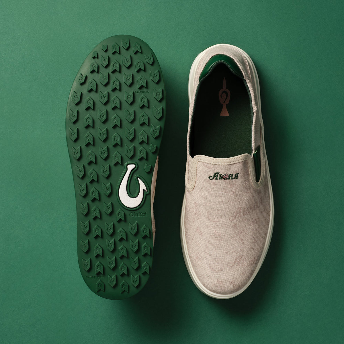 Cream slip-on shoe with tapa pattern shown from top and bottom, displaying green sole with tread pattern and white rubber tri
