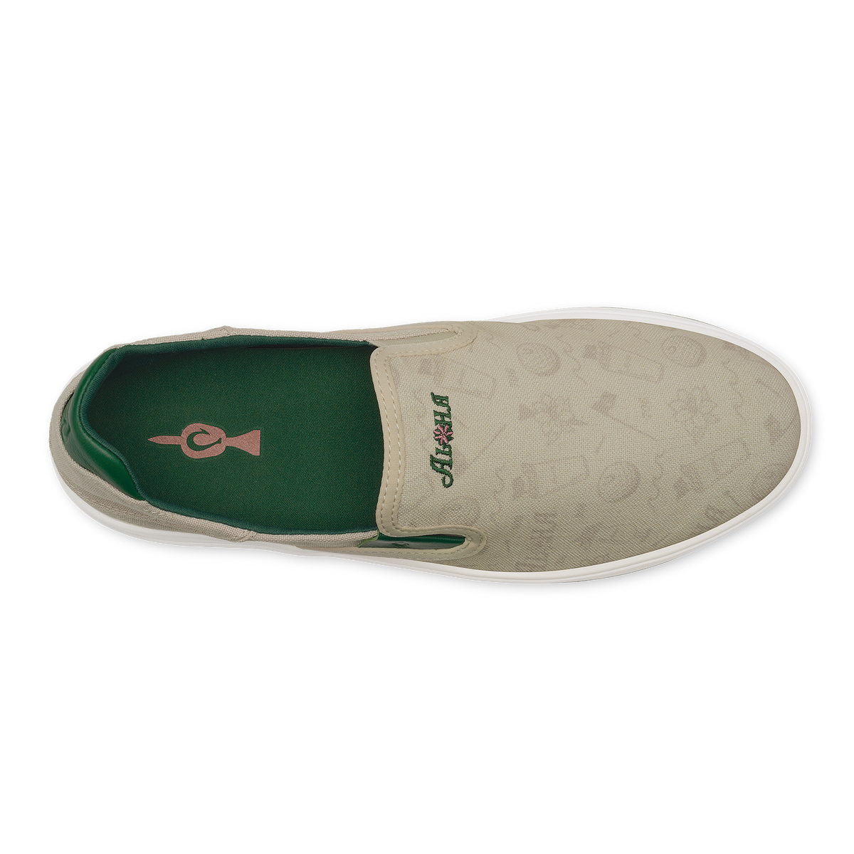 Beige slip-on shoe with green interior lining and white sole, shown from above.