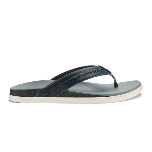 Pale grey and dark navy flip-flop sandal with textured sole and toe post strap.