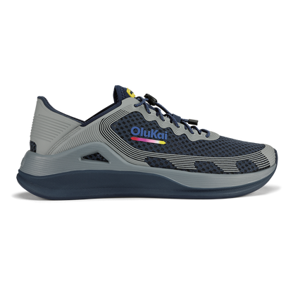 Navy and gray mesh running shoe with striped design and colorful OluKai logo on the side.