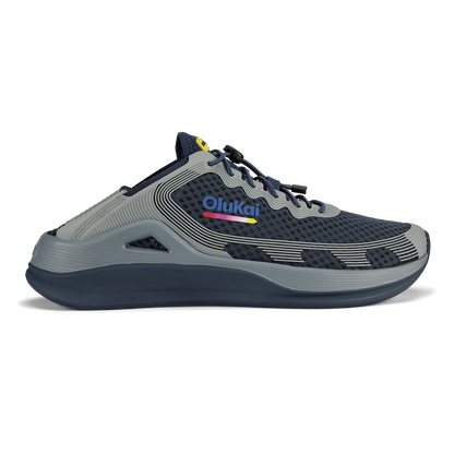 Navy and gray athletic running shoe with colorful Olukai branding and black sole.
