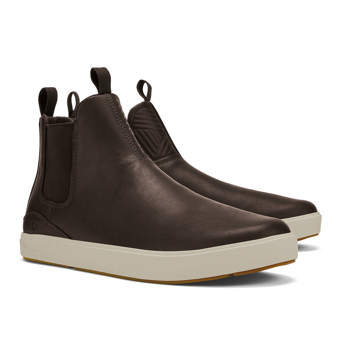Dark brown leather Chelsea boot with cream-colored sole and elastic side panels.