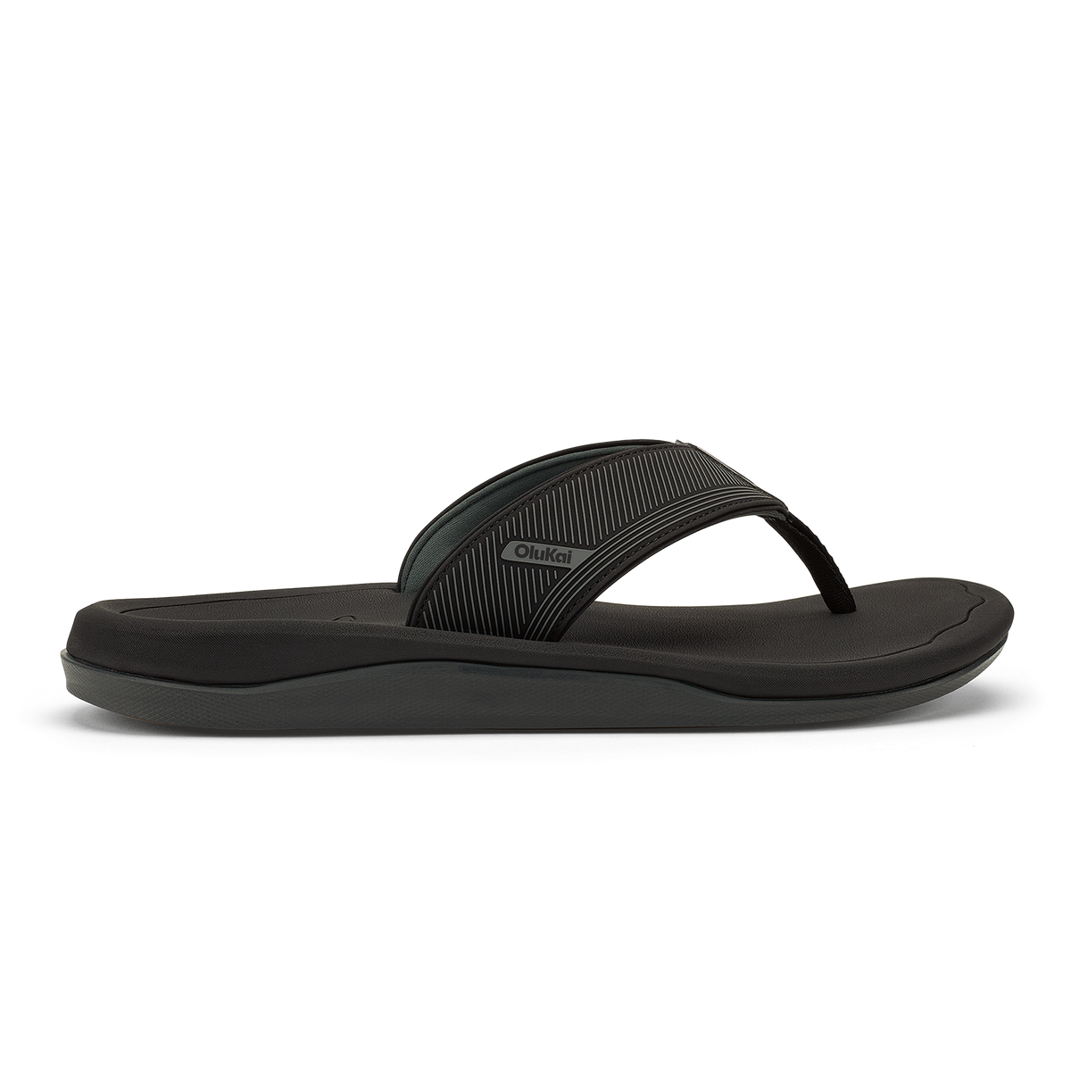 Black flip-flop sandal with textured strap and cushioned sole, shown in side profile.