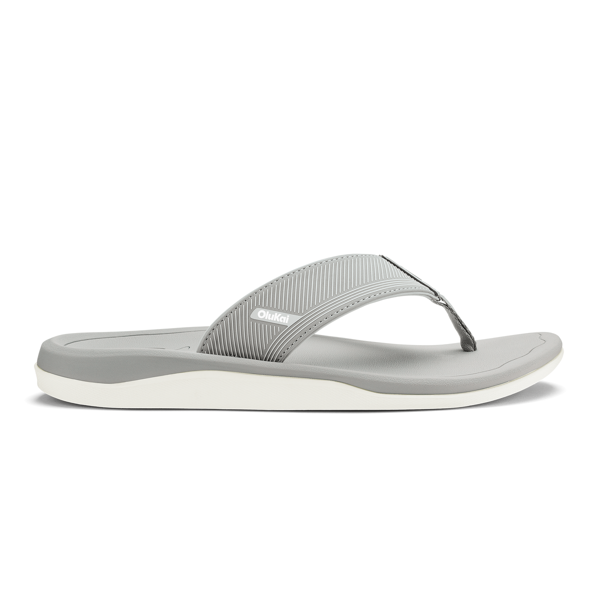 Gray and white thong-style sandal with ribbed upper strap and curved foam sole.