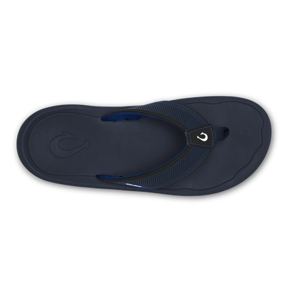 Dark blue thong sandal with striped fabric strap and white logo detail on the heel.