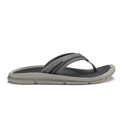 Gray and black thong sandal with cushioned sole and decorative stitching on the upper strap.