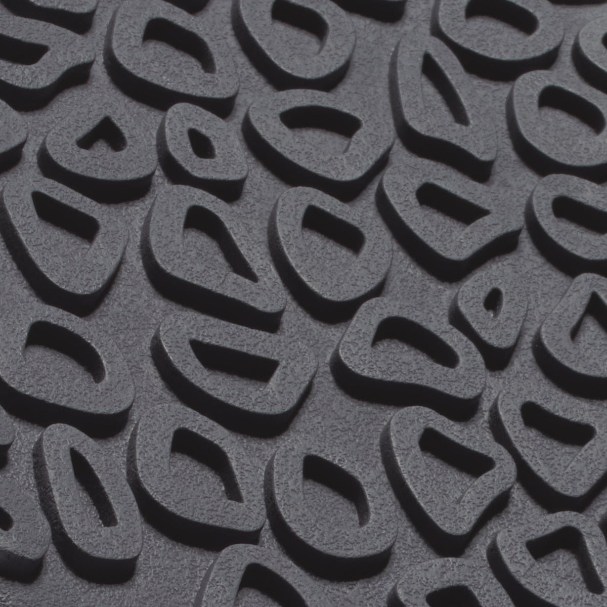 Grey textured sole with repeating curved tread pattern and oval cutout details.