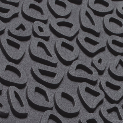 Grey textured sole with repeating curved tread pattern and oval cutout details.