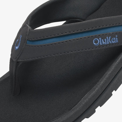 Black thong sandal with slate blue accent band and embroidered logo on strap.