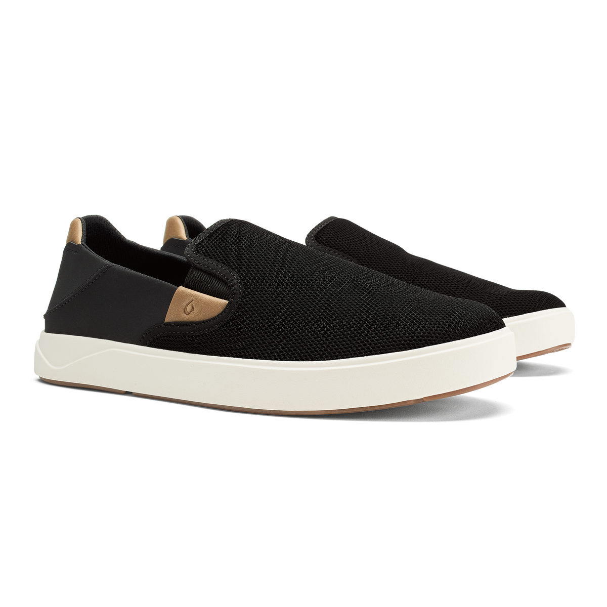 Black slip-on sneaker with tan heel panel and white sole.