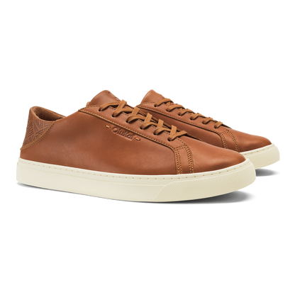Tan leather lace-up sneaker with cream rubber sole and geometric heel detail.