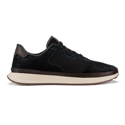 Black lace-up sneaker with mesh and suede upper, dark brown heel tab, and cream-colored sole.