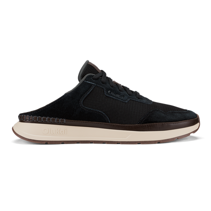 Black slip-on sneaker with mesh and suede upper, cream midsole, and brown trim detail.