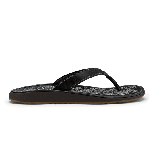 Black flip-flop sandal with woven textured footbed and contrasting stitched thong strap.