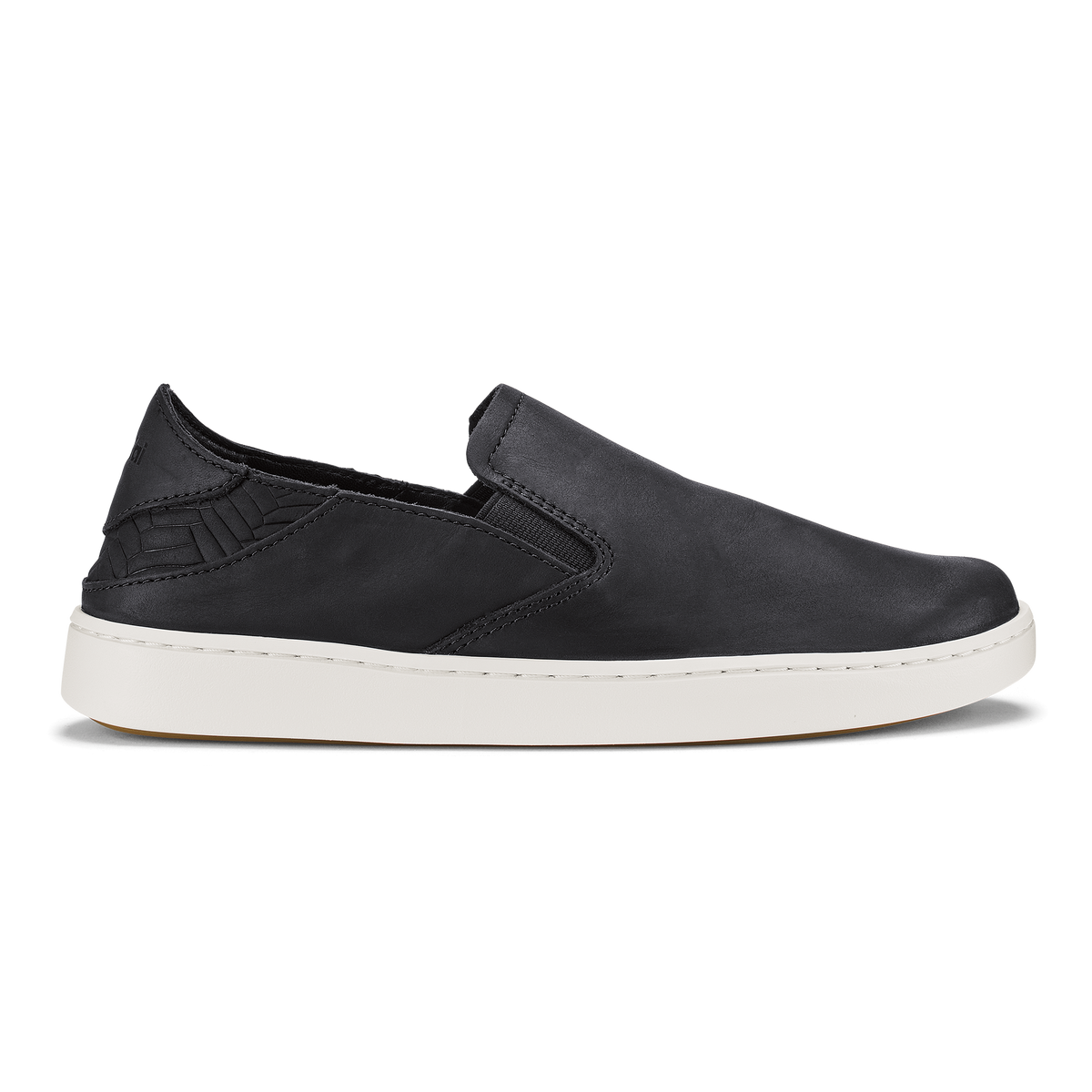 Black leather slip-on shoe with white sole, shown in profile view.