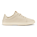 Cream-colored leather lace-up sneaker with tan heel accent and stitched details, shown in profile view.