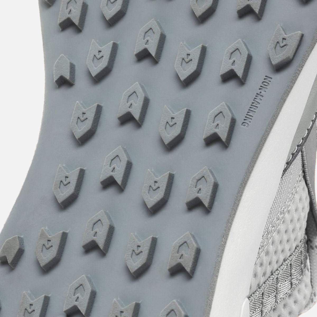 Cloud grey shoe sole with geometric tread pattern and white stripe accent.