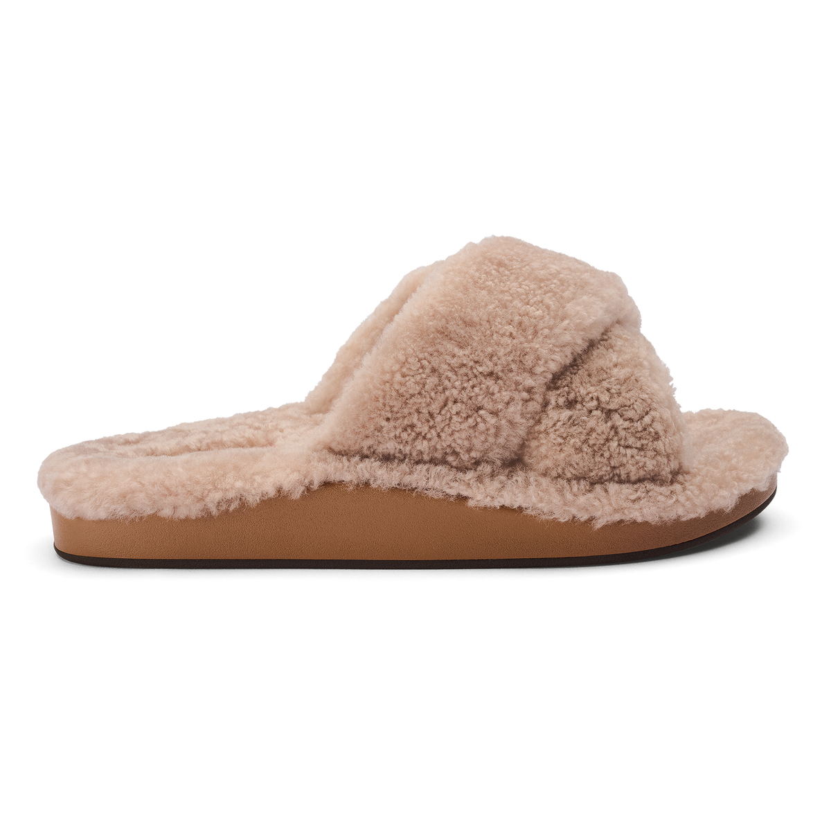 Tan fuzzy slippers with a knotted bow detail on the upper and brown sole, shown in profile view.