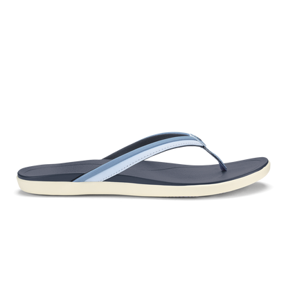 Navy flip-flop with light blue toe strap and cream-colored sole, shown in profile against white background.