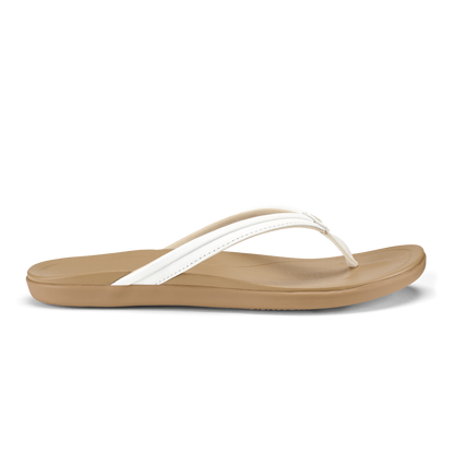 Tan and white flip-flop sandal with curved footbed and thin white strap across the foot.