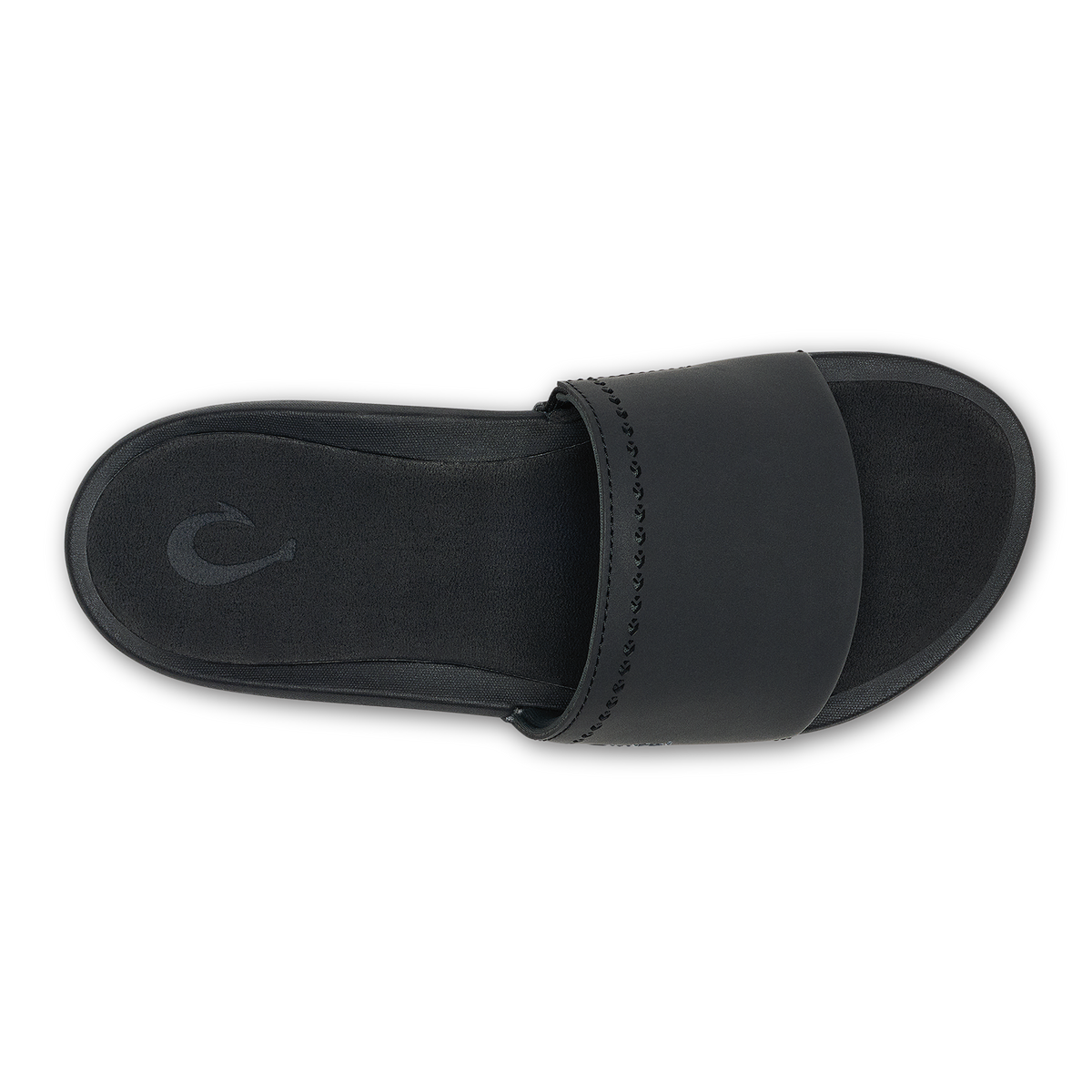 Black slide sandal with padded band across the foot and textured sole, shown from above.