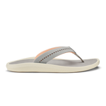 Ash-colored thong sandal with peach accent stripe, studded strap detail, and cream-colored ridged sole.