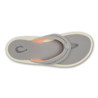 Gray thong sandal with cream sole, orange accents, and curved strap detail, shown from above.