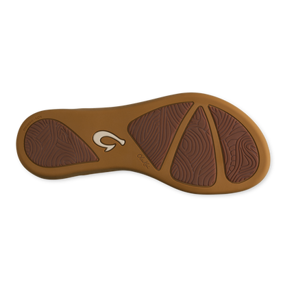 Toffee-colored sandal sole with curved design, textured grip pattern, and brand logo.