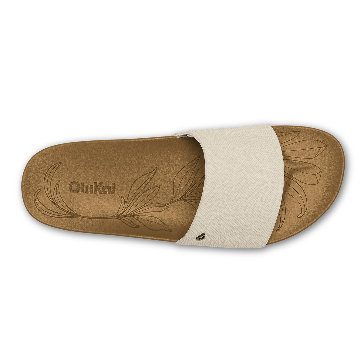 Tan slide sandal with cream crosshatch strap and embossed leaf design on footbed.
