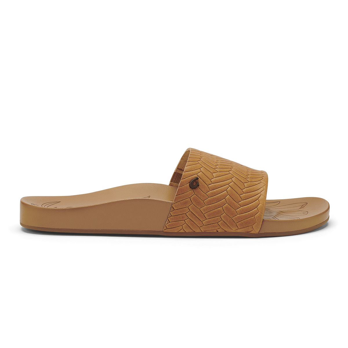 Tan slide sandal with woven herringbone pattern upper and flat sole.