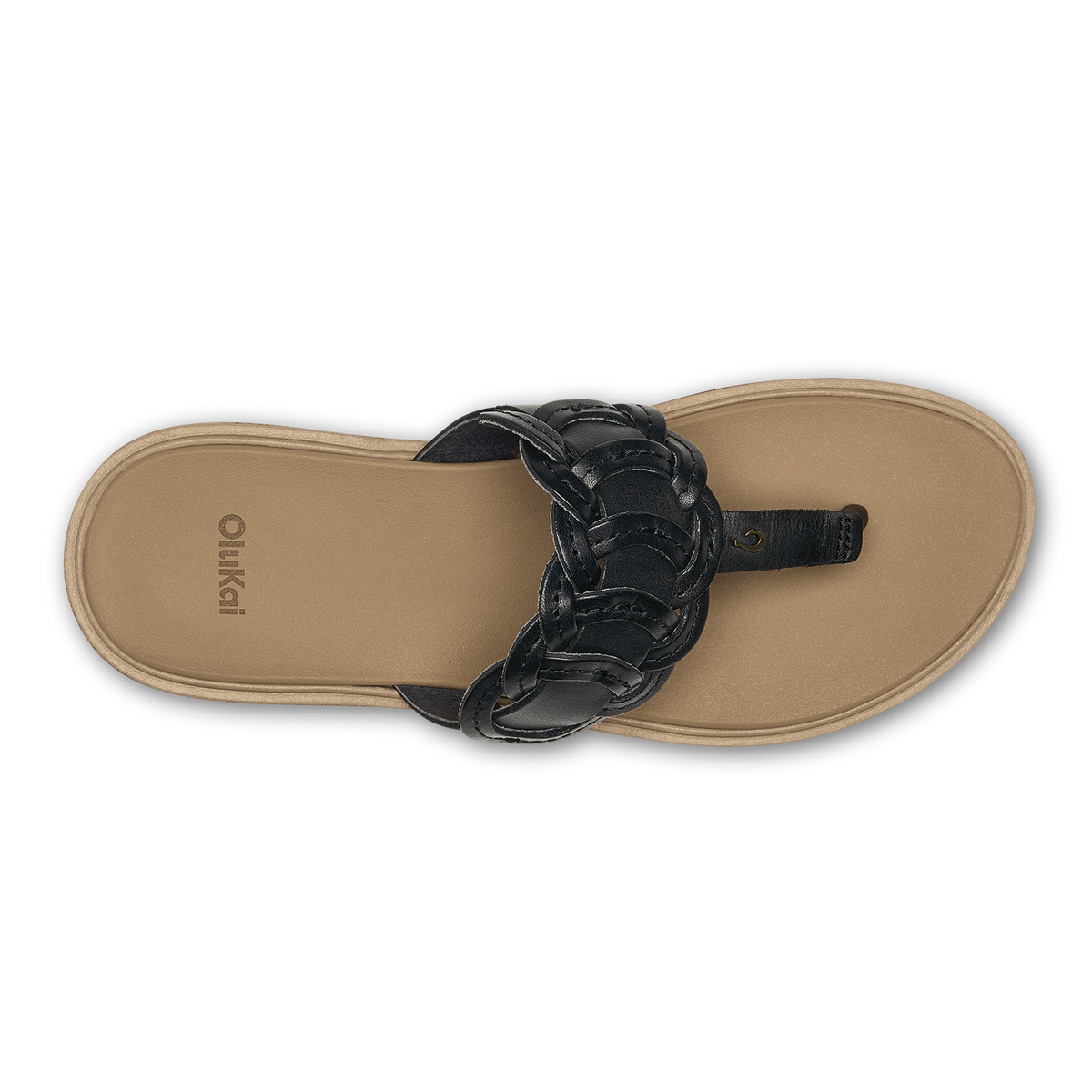Flat lay of a black braided thong sandal with warm sand-colored sole, branded "Olukai" on footbed.