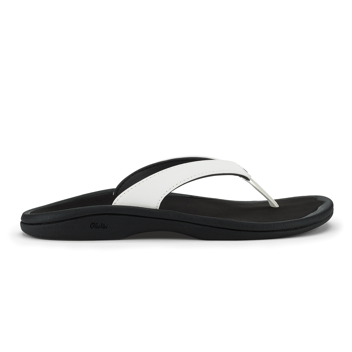 Black and white thong sandal with curved footbed and contrasting strap design.