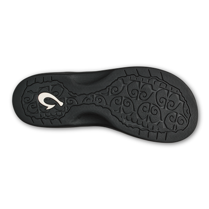 Black sole with white curved logo and decorative spiral pattern throughout.
