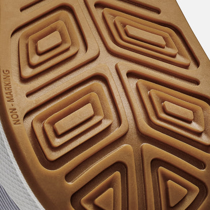 Tan rubber sole with geometric nested rectangle and triangle tread pattern and "HOON MARKING" text on edge.