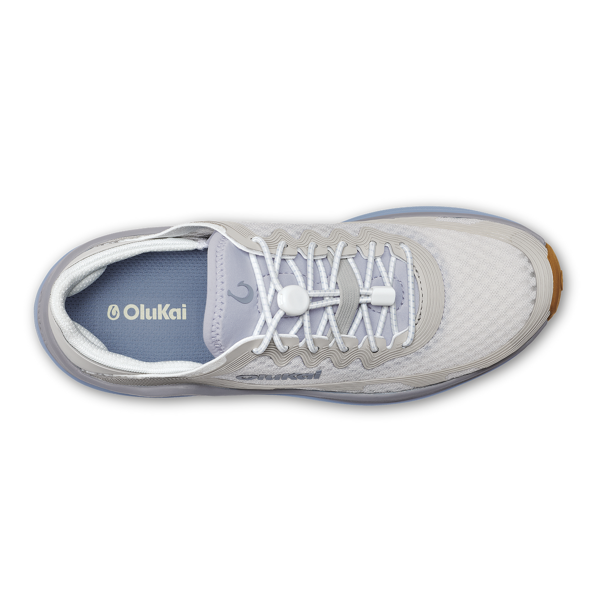White and blue OluKai Ahi sneaker with white laces and gum sole, shown from above.