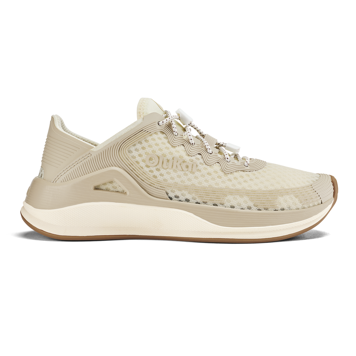Cream-colored running shoe with mesh and ribbed textile upper, white midsole, and tan rubber outsole.