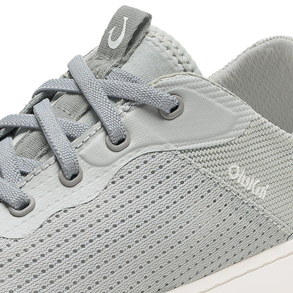 Cloud grey lace-up sneaker with mesh and leather upper, perforated details, and white sole.