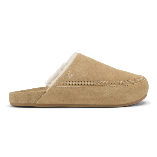 Tan suede slipper with white fleece lining and stitched seam detail along the sole.